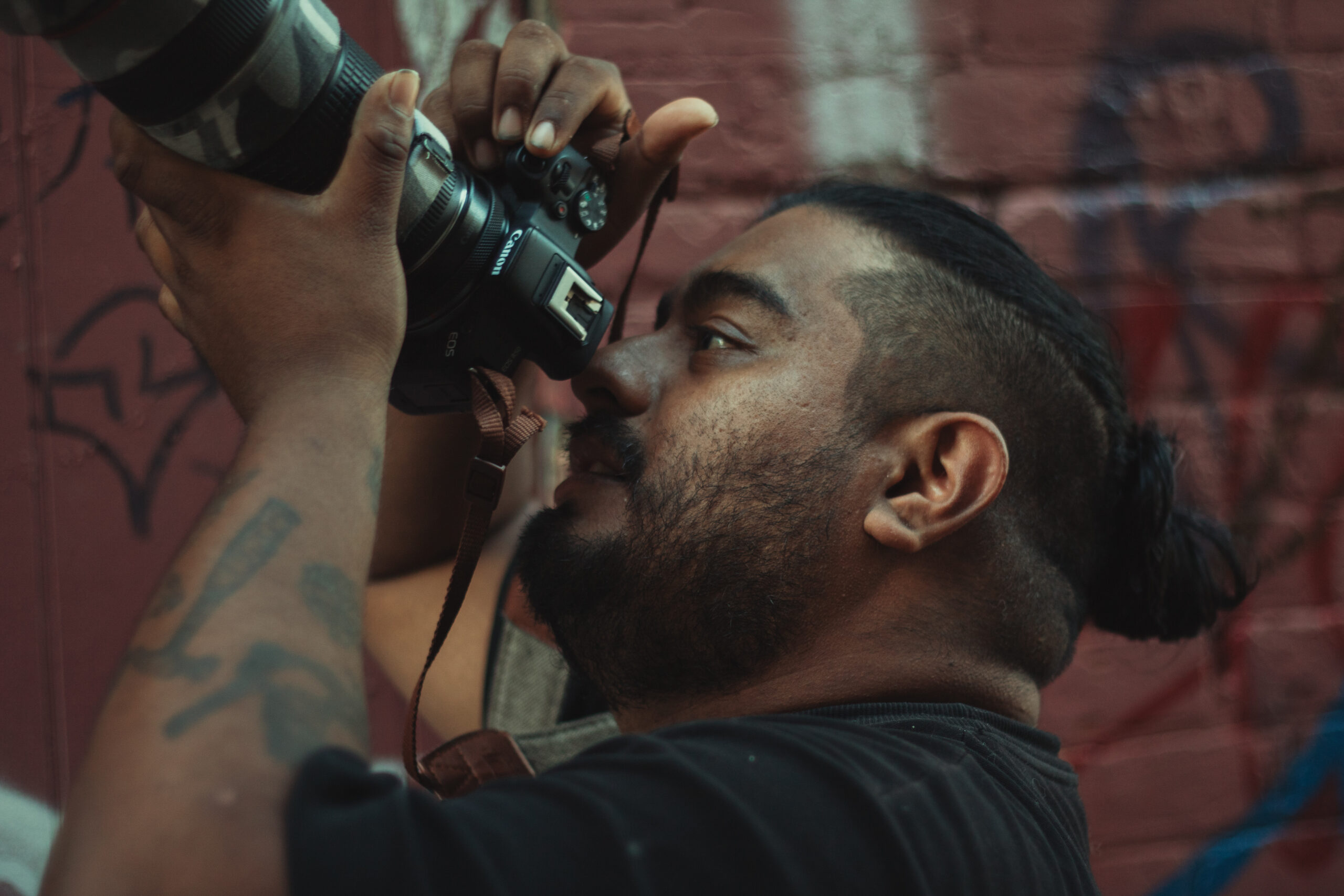 Man taking photo with his Canon Camera