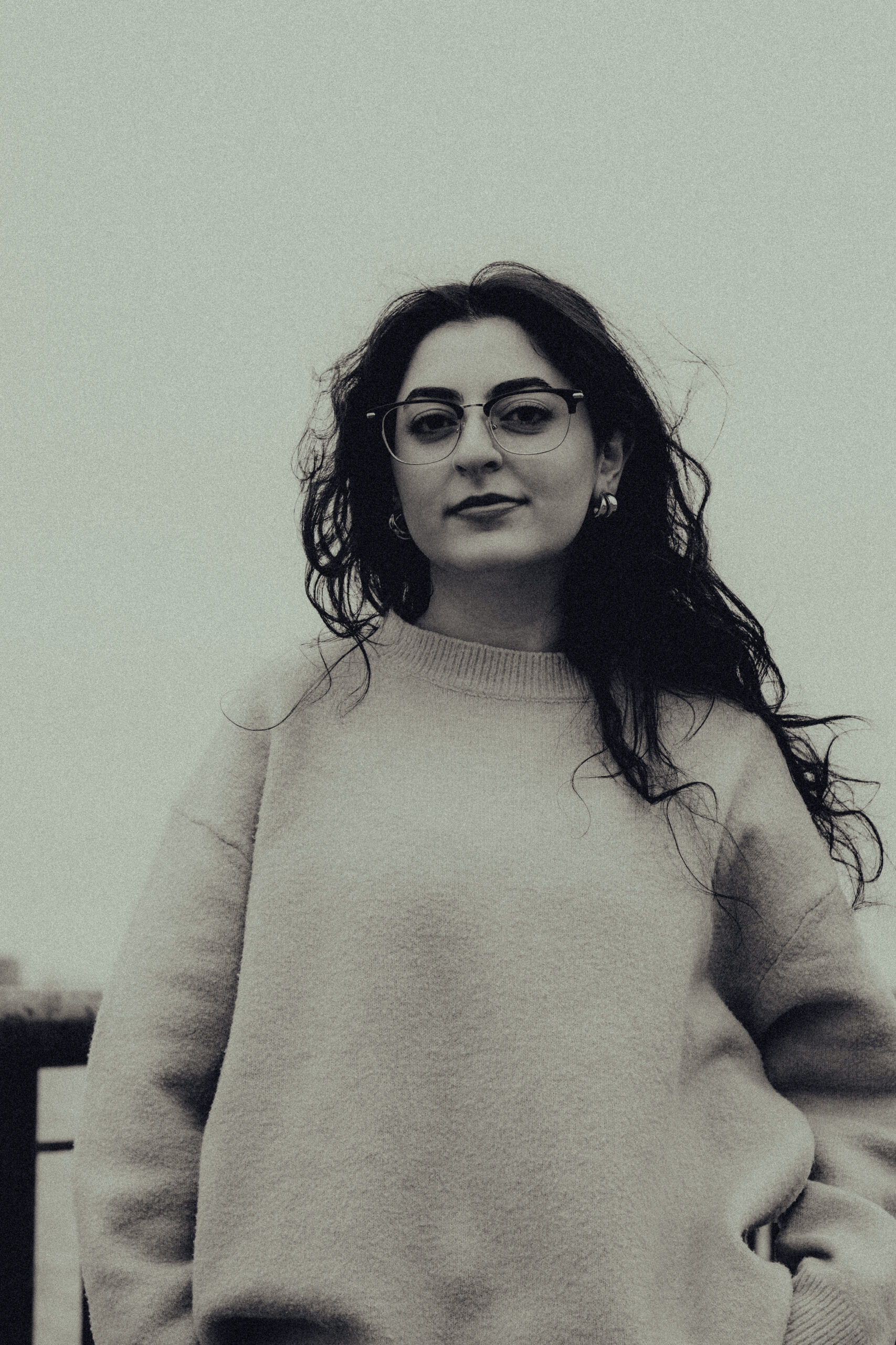 Monochrome photo of a woman outside